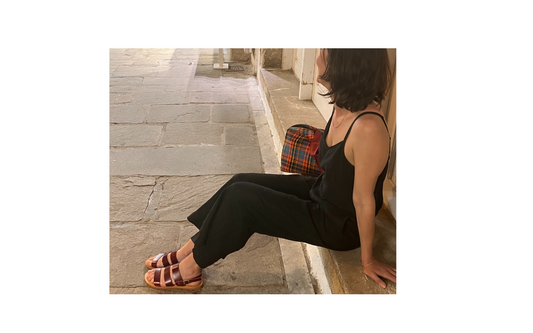 Girl wearing handcrafted cretan sandals