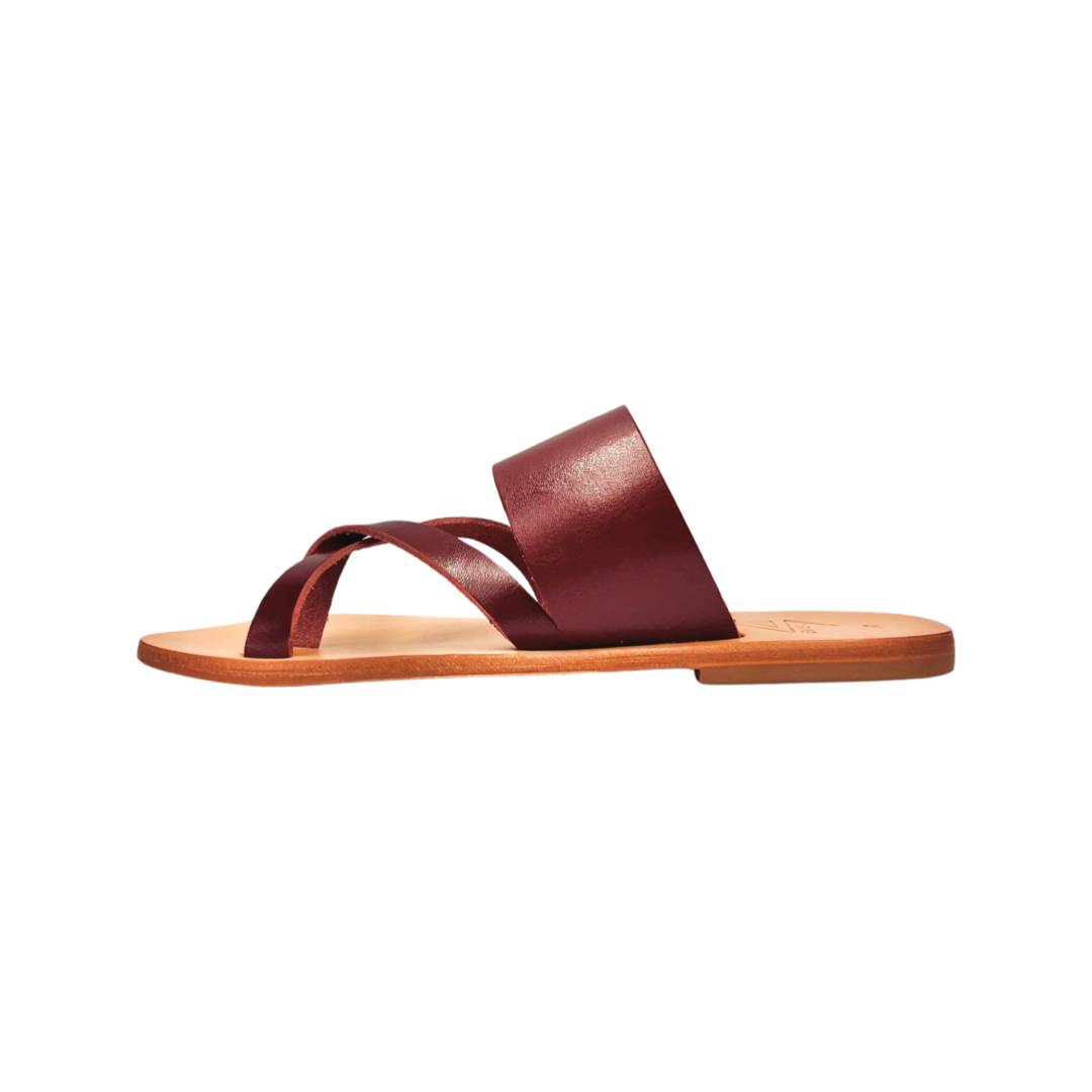 pair of red leather sandals from the side