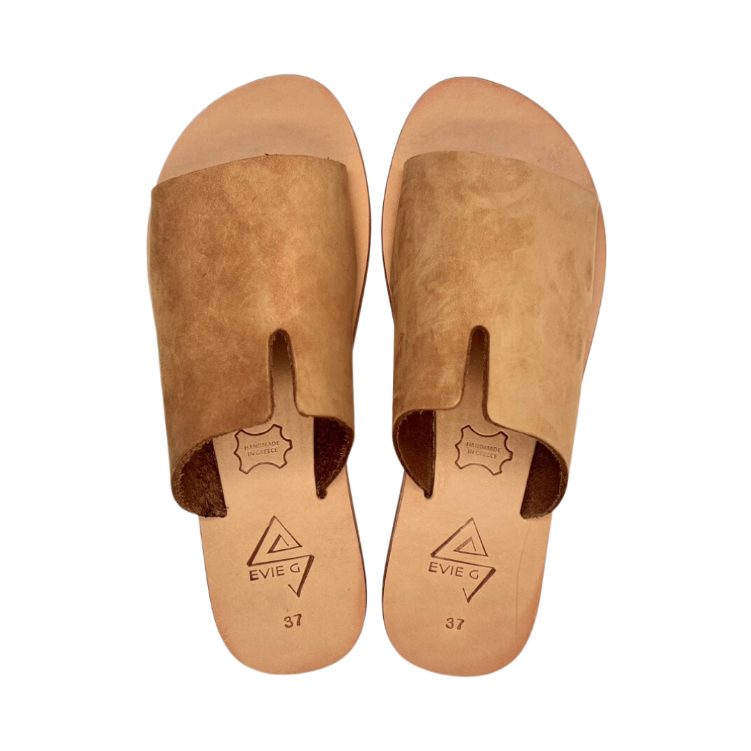 pair of beige leather sandals from the top