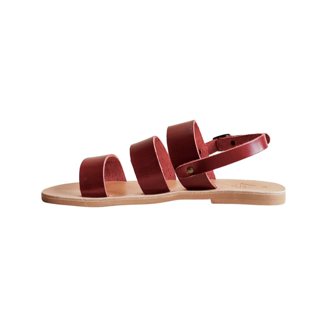 pair of red leather sandals from the side
